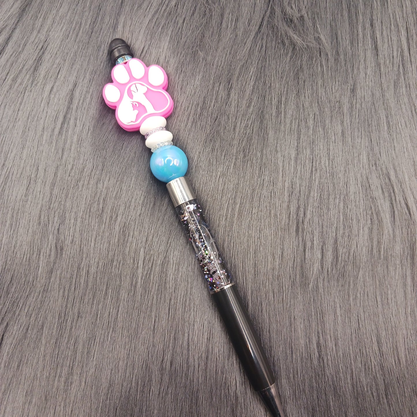 Pink animal pawprint snowglobe pen