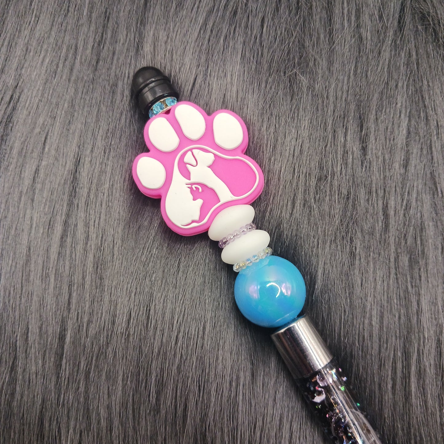 Pink animal pawprint snowglobe pen