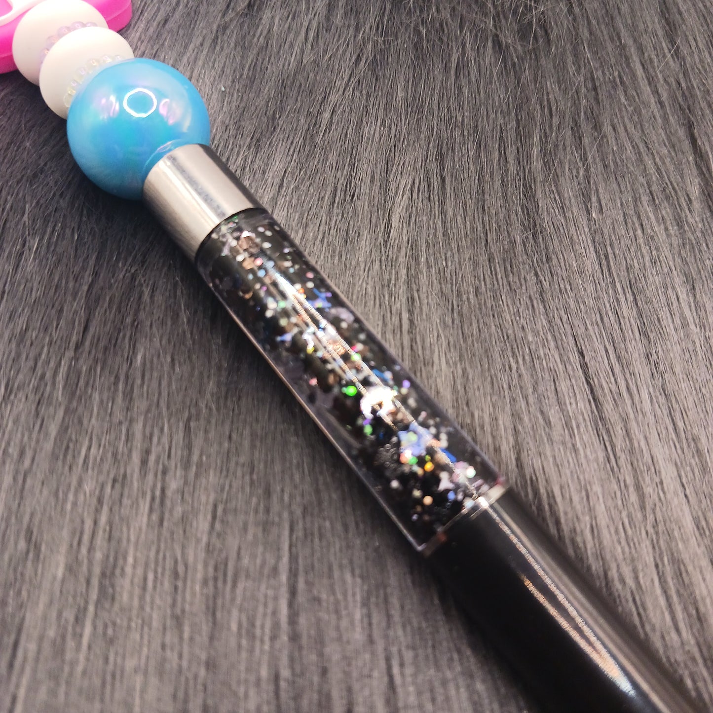 Pink animal pawprint snowglobe pen