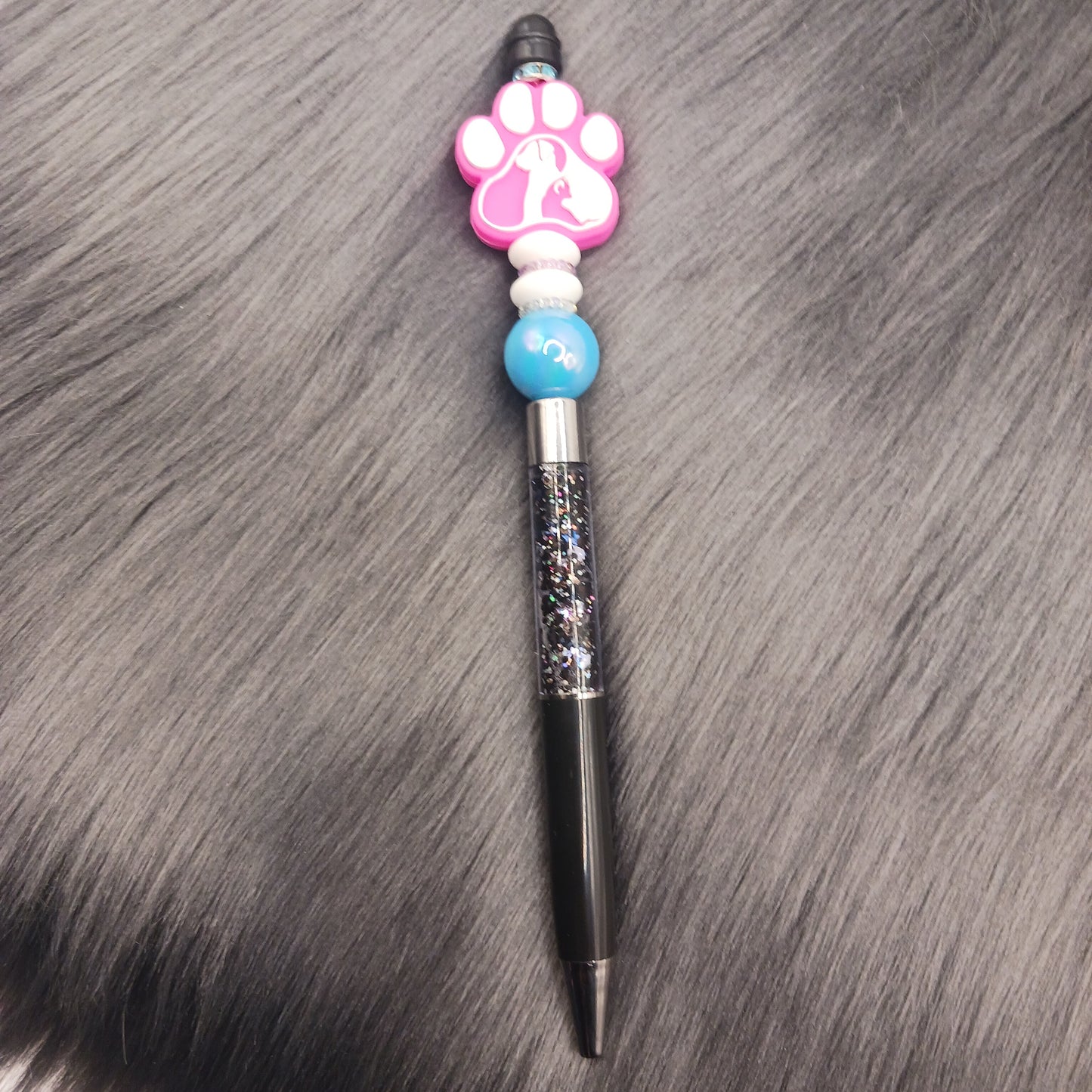 Pink animal pawprint snowglobe pen