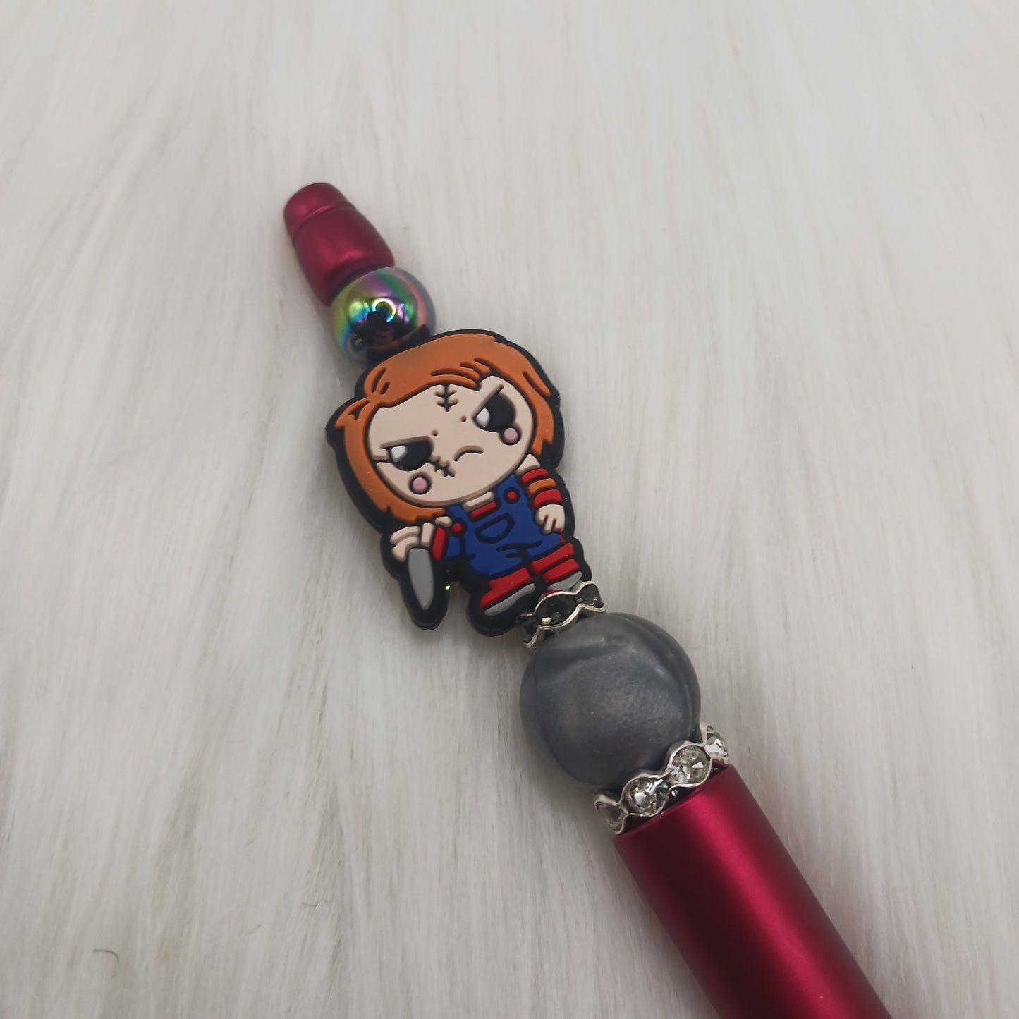 Horror doll beaded pen