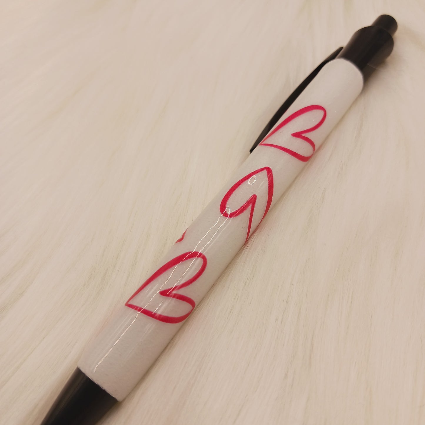 White with pink heart epoxy glitter pen