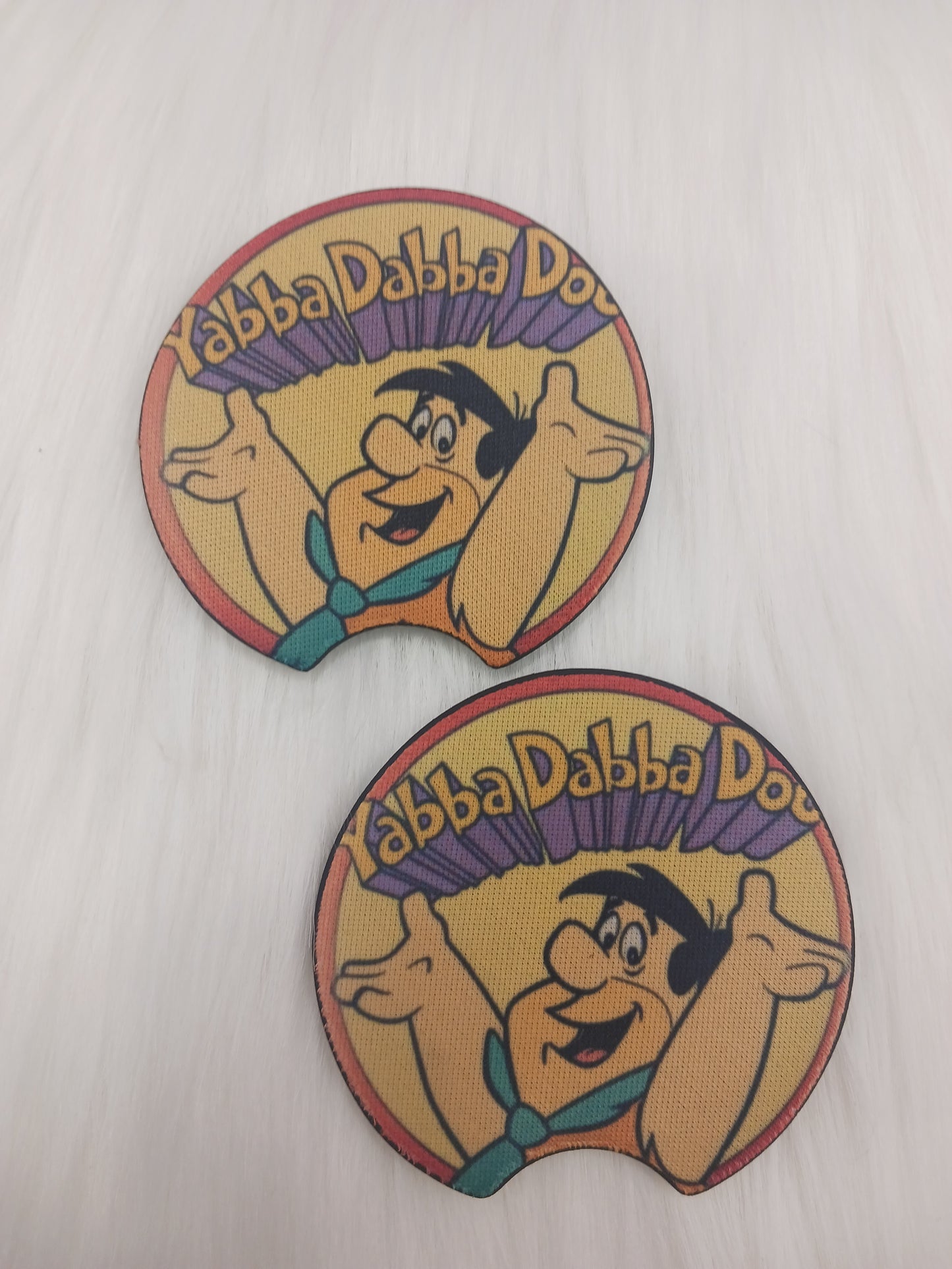 Our favorite caveman car coasters