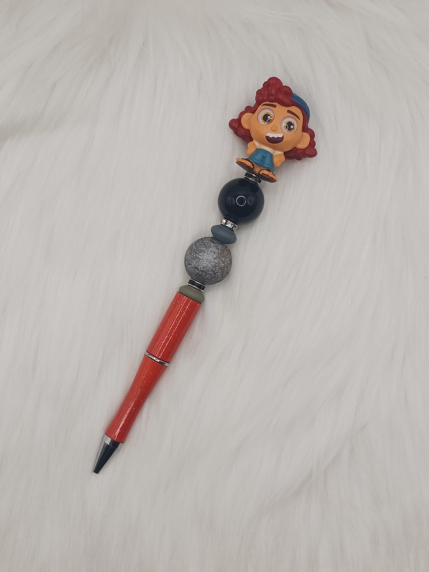 Red haired character topped beaded pen