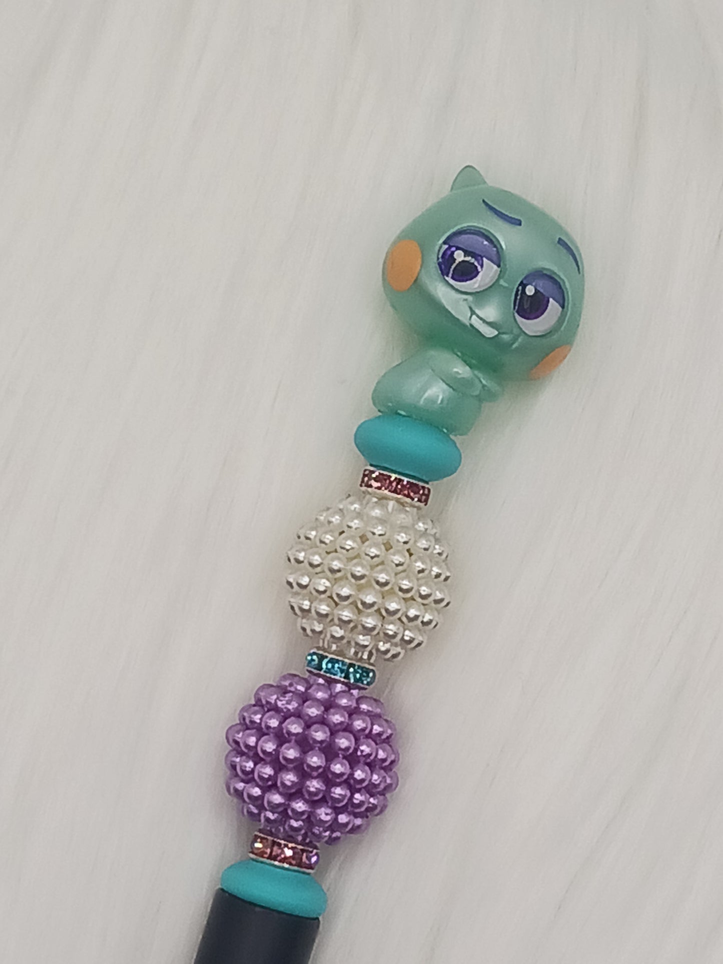 Character topped beaded pen