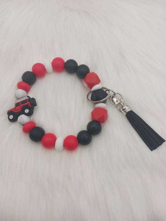Red off roaded vehicle silicone beaded Wristlet
