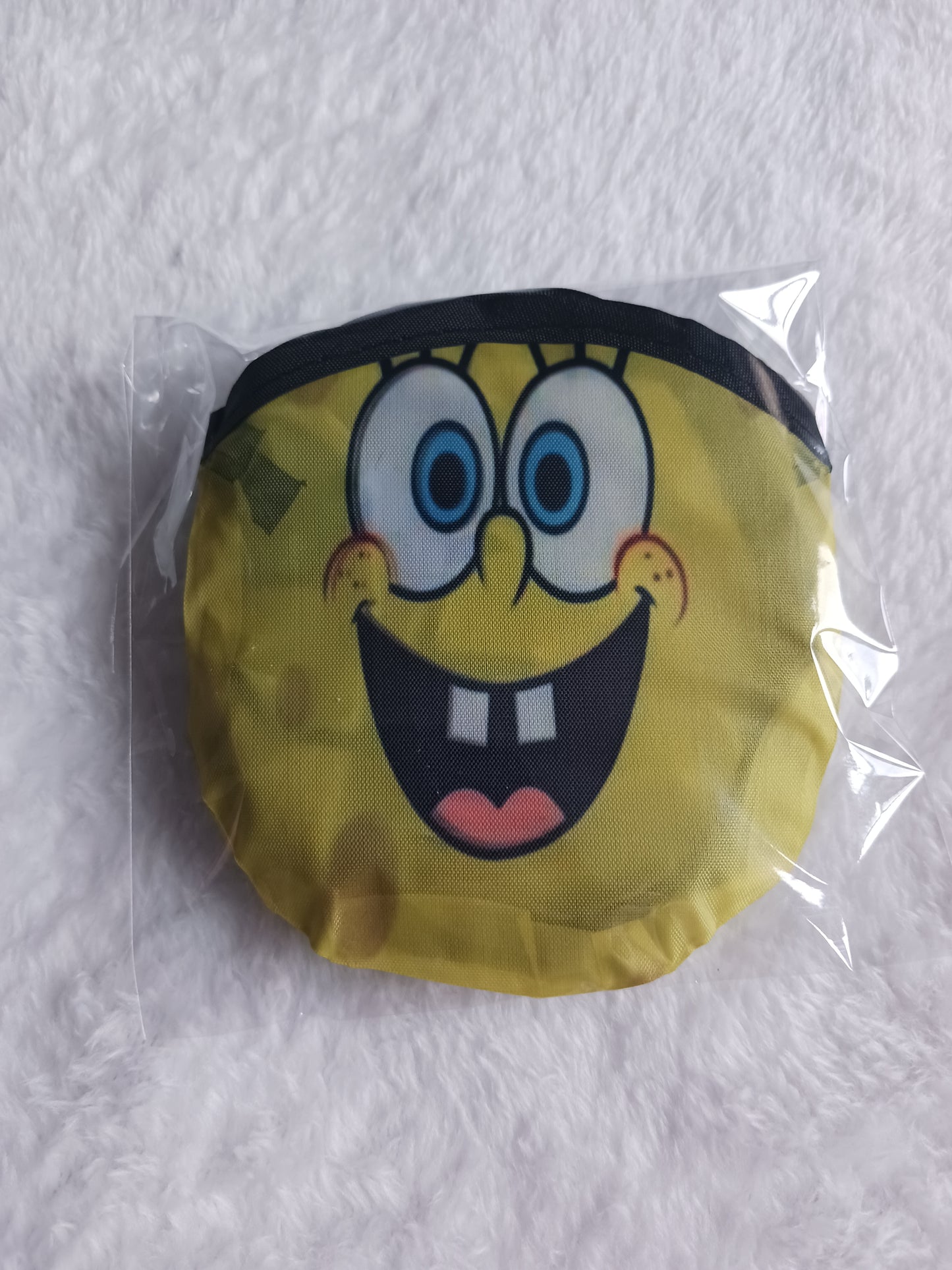 Yellow sponge cartoon flying disc