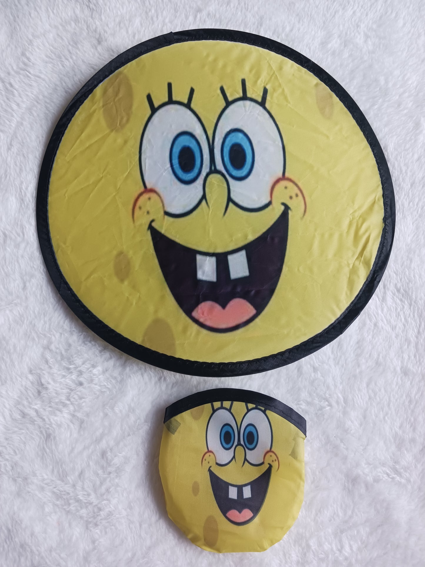 Yellow sponge cartoon flying disc