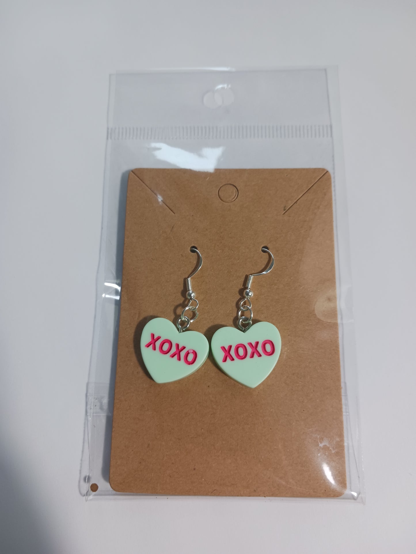 XOXO heart dangle earrings