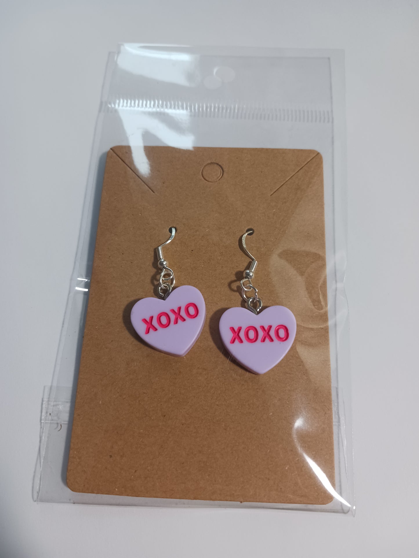 XOXO heart dangle earrings