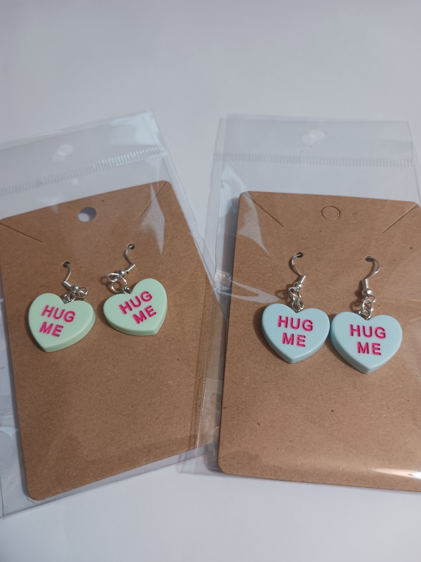 Hug me message heart earrings