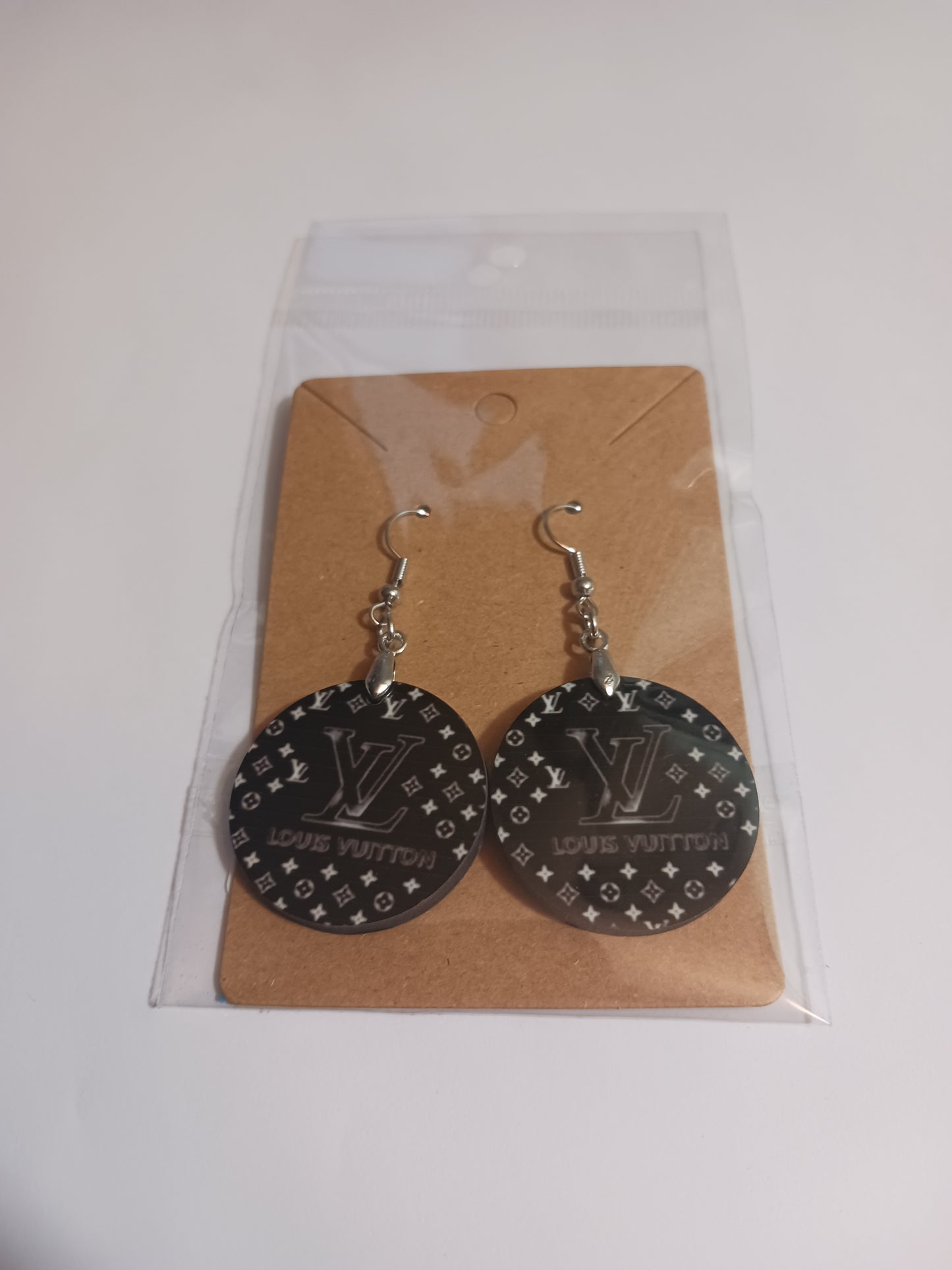 Black round insp. Earrings