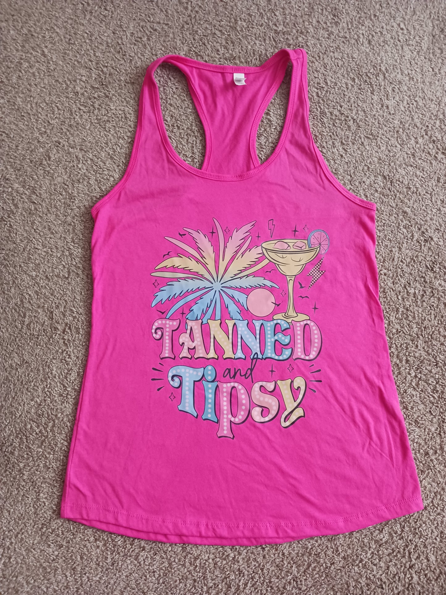 Pink tanned & tipsy racerback tank top