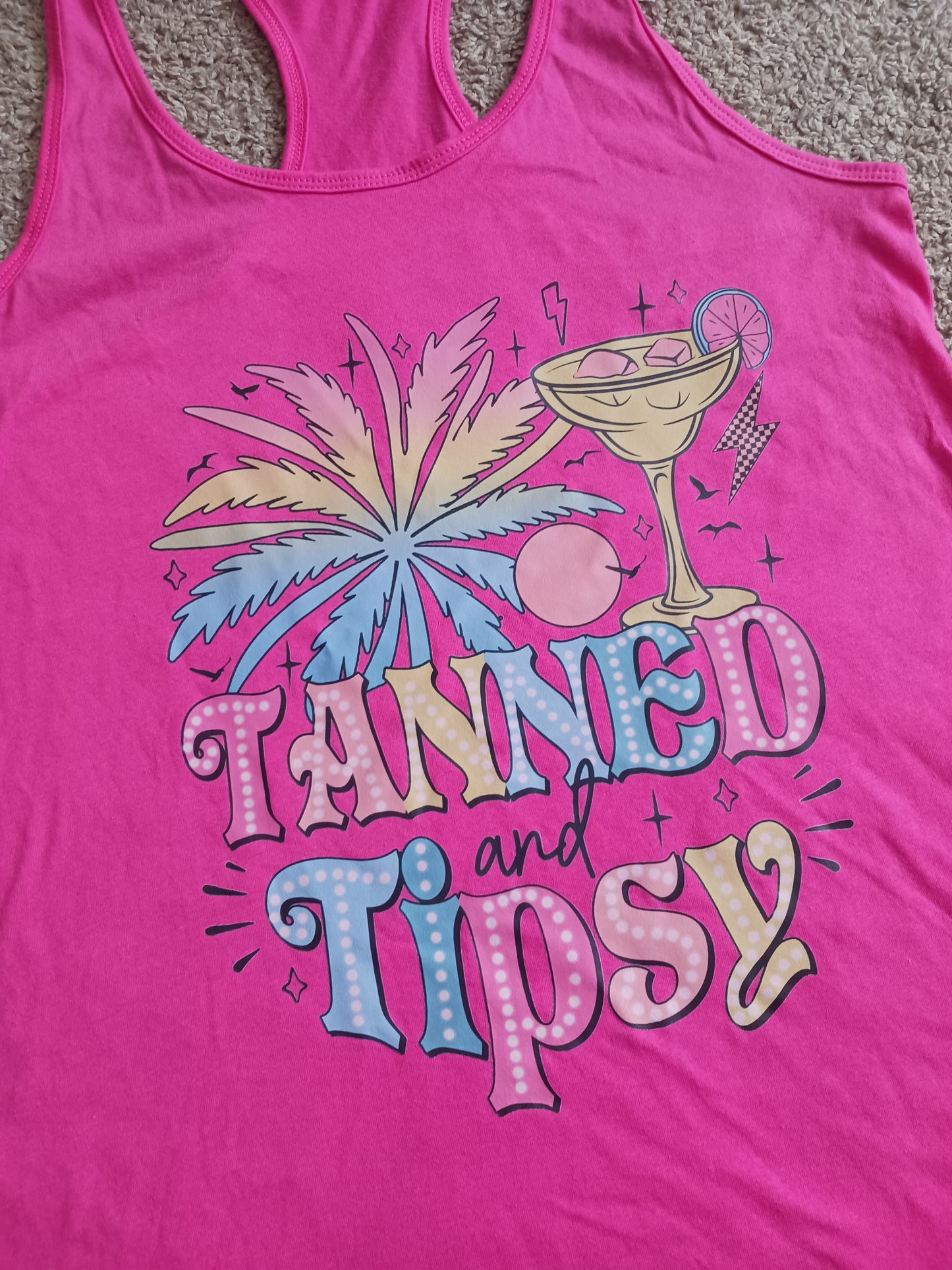 Pink tanned & tipsy racerback tank top