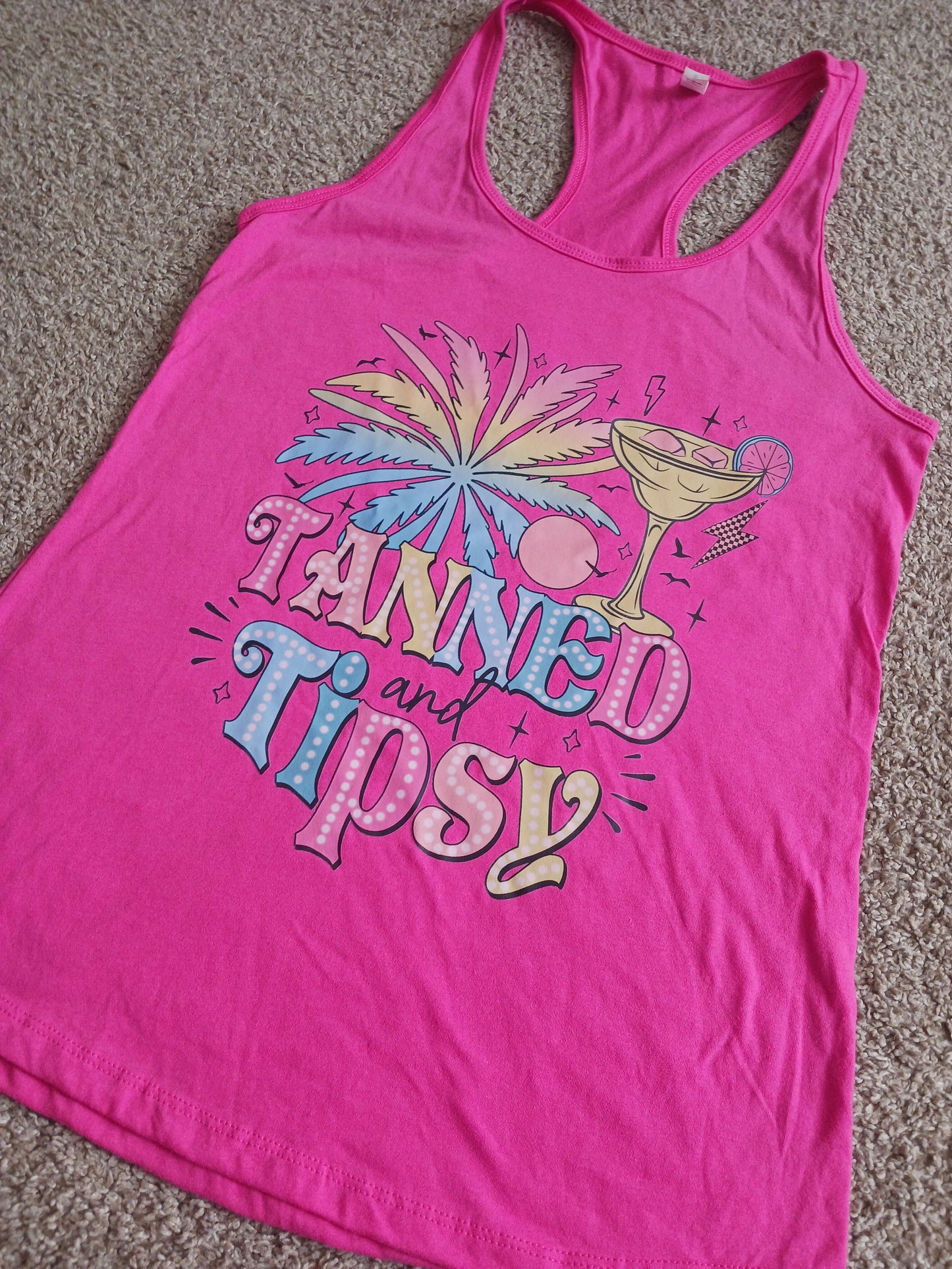 Pink tanned & tipsy racerback tank top