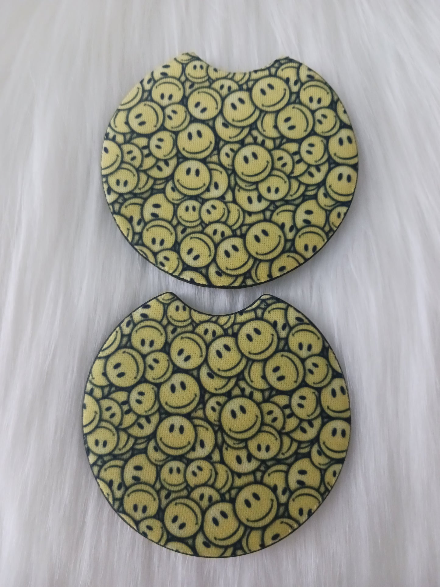 Yellow smiles car coasters