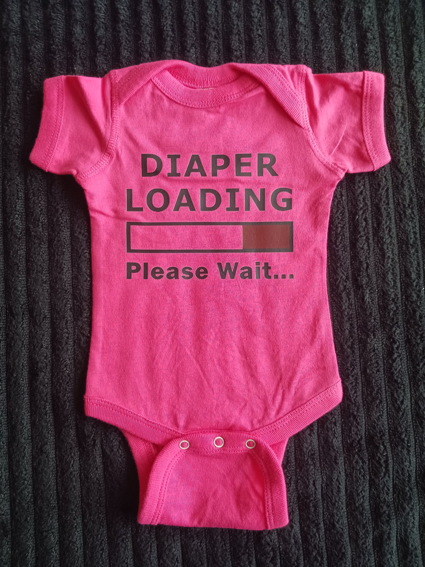 Diaper loading onesie