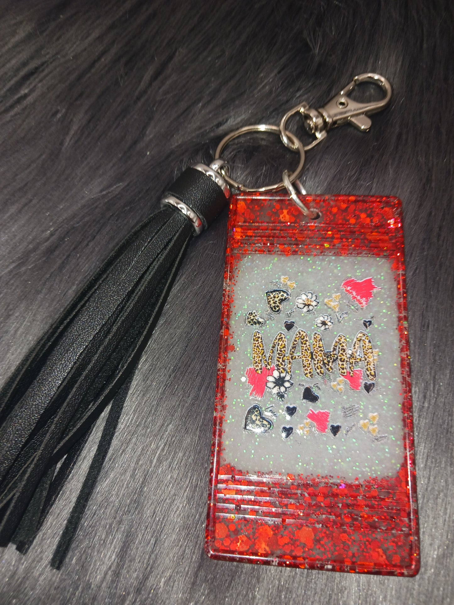 Red and black Mama keychain with tassel