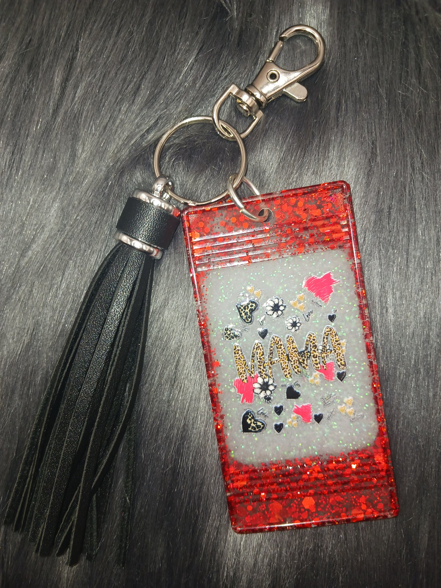 Red and black Mama keychain with tassel