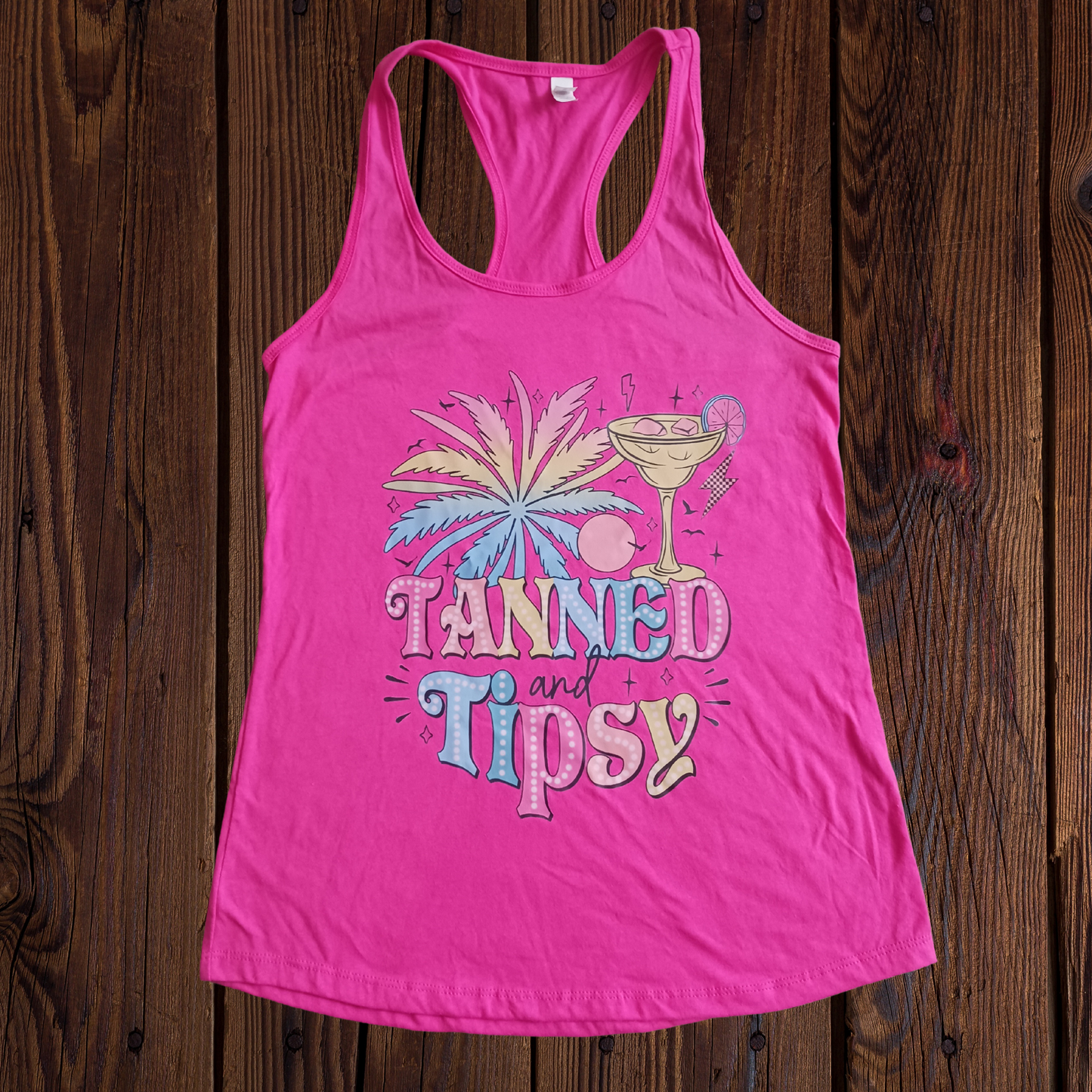 Pink tanned & tipsy racerback tank top