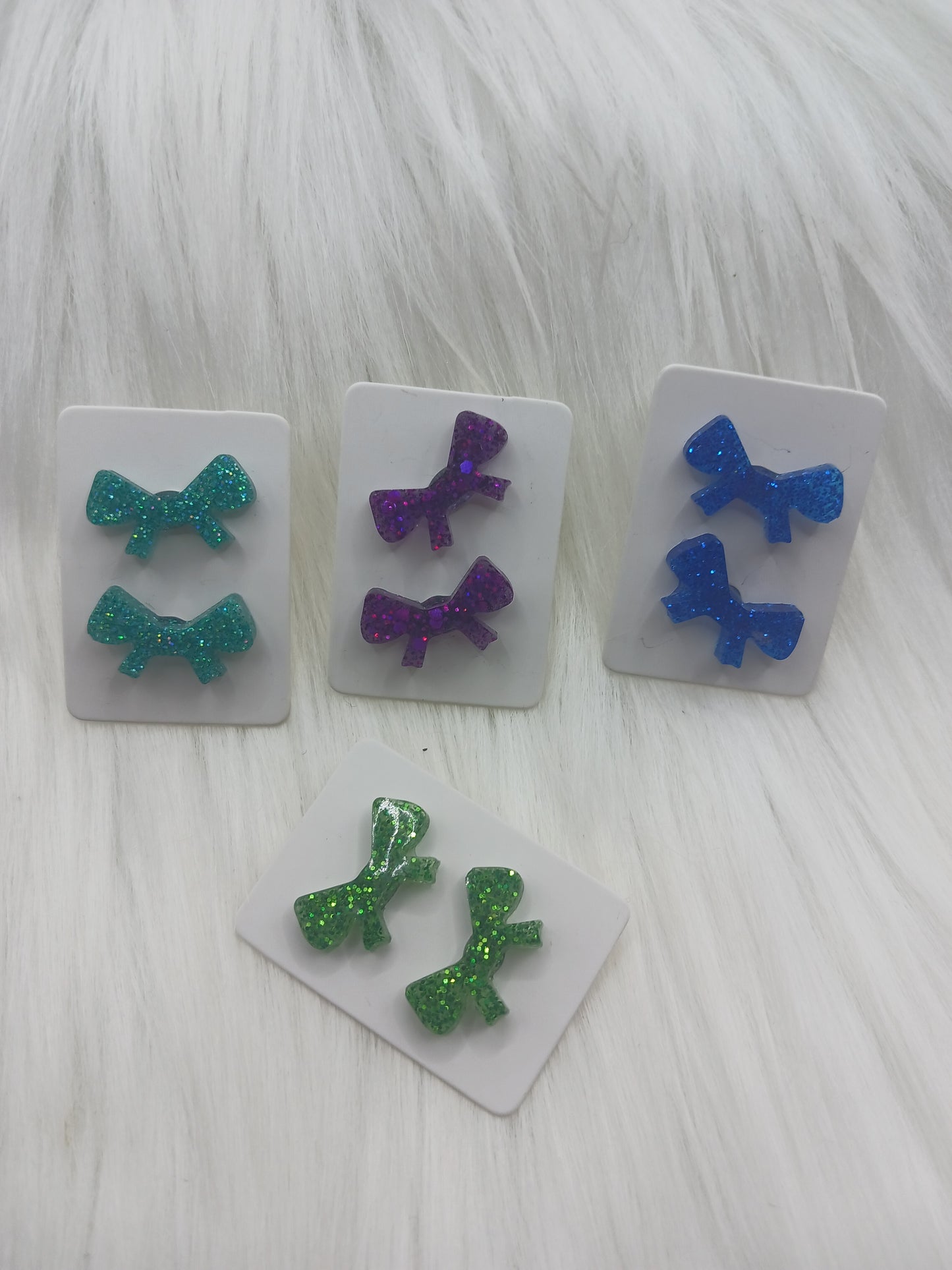 Bow shape stud earrings