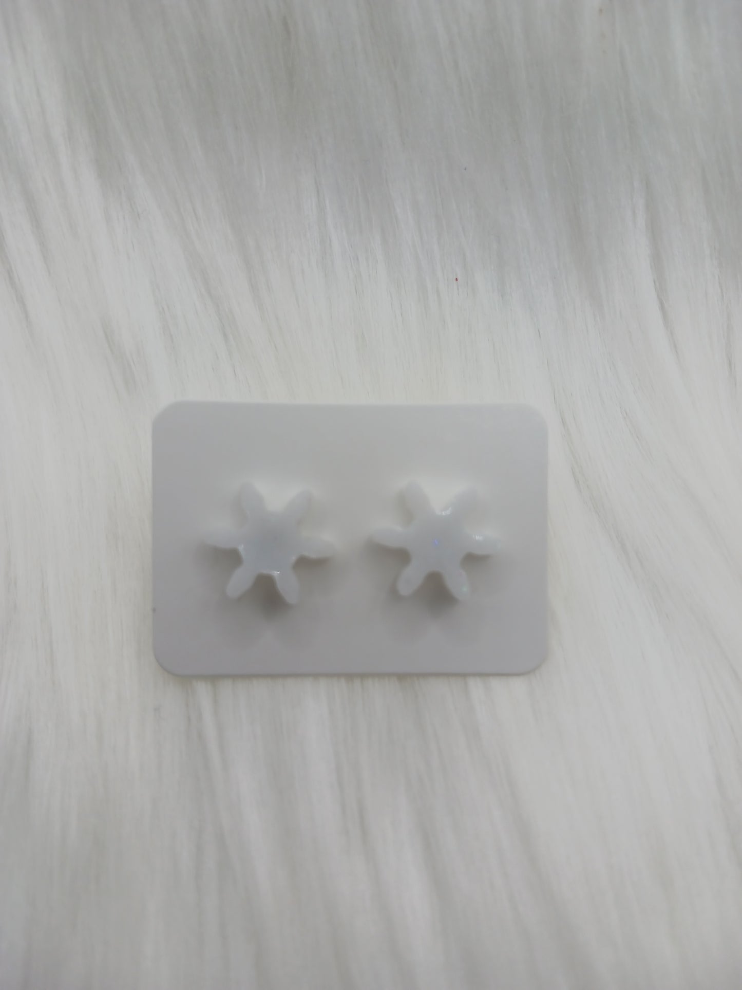 Snowflake stud earrings