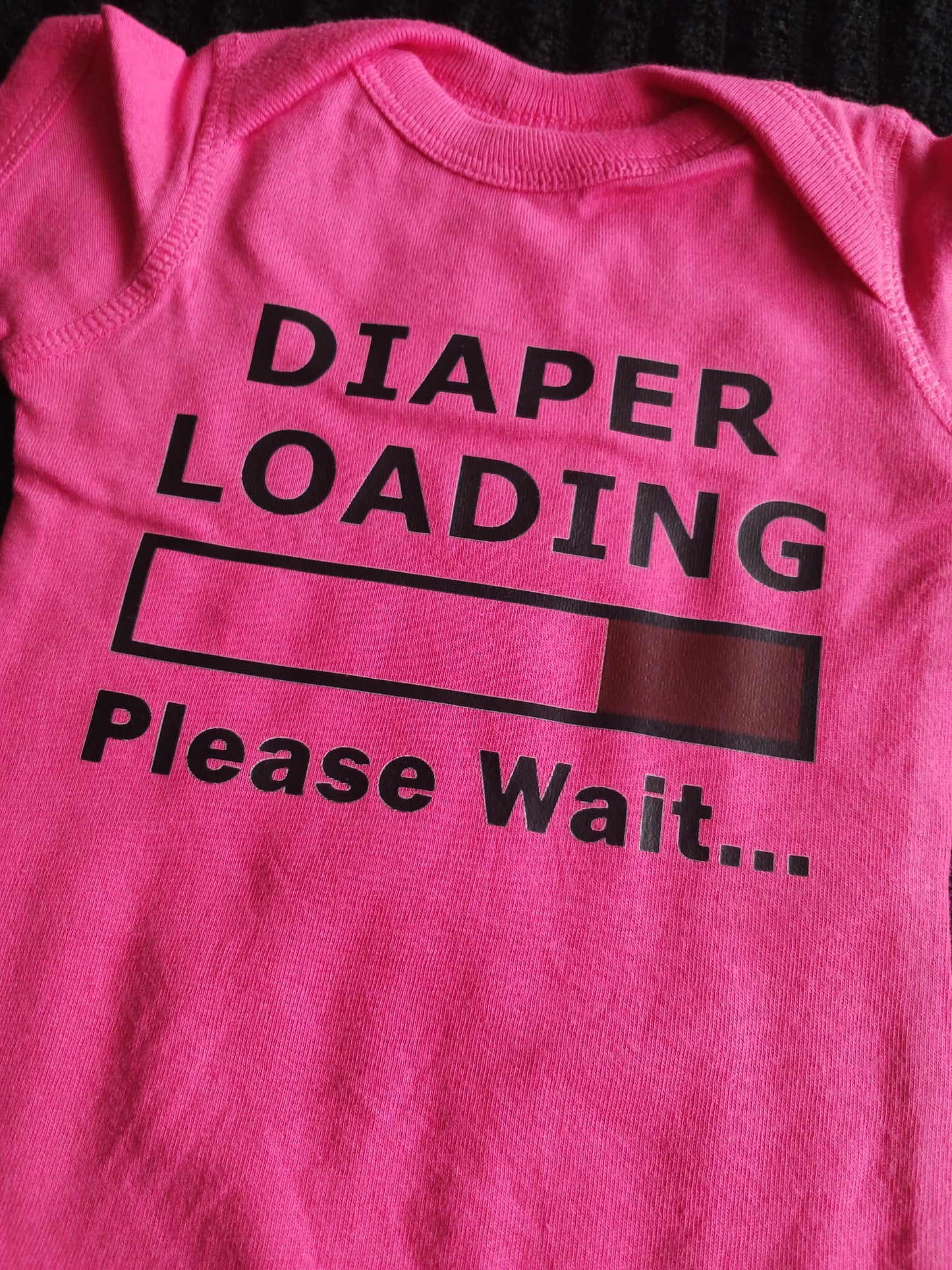 Diaper loading onesie