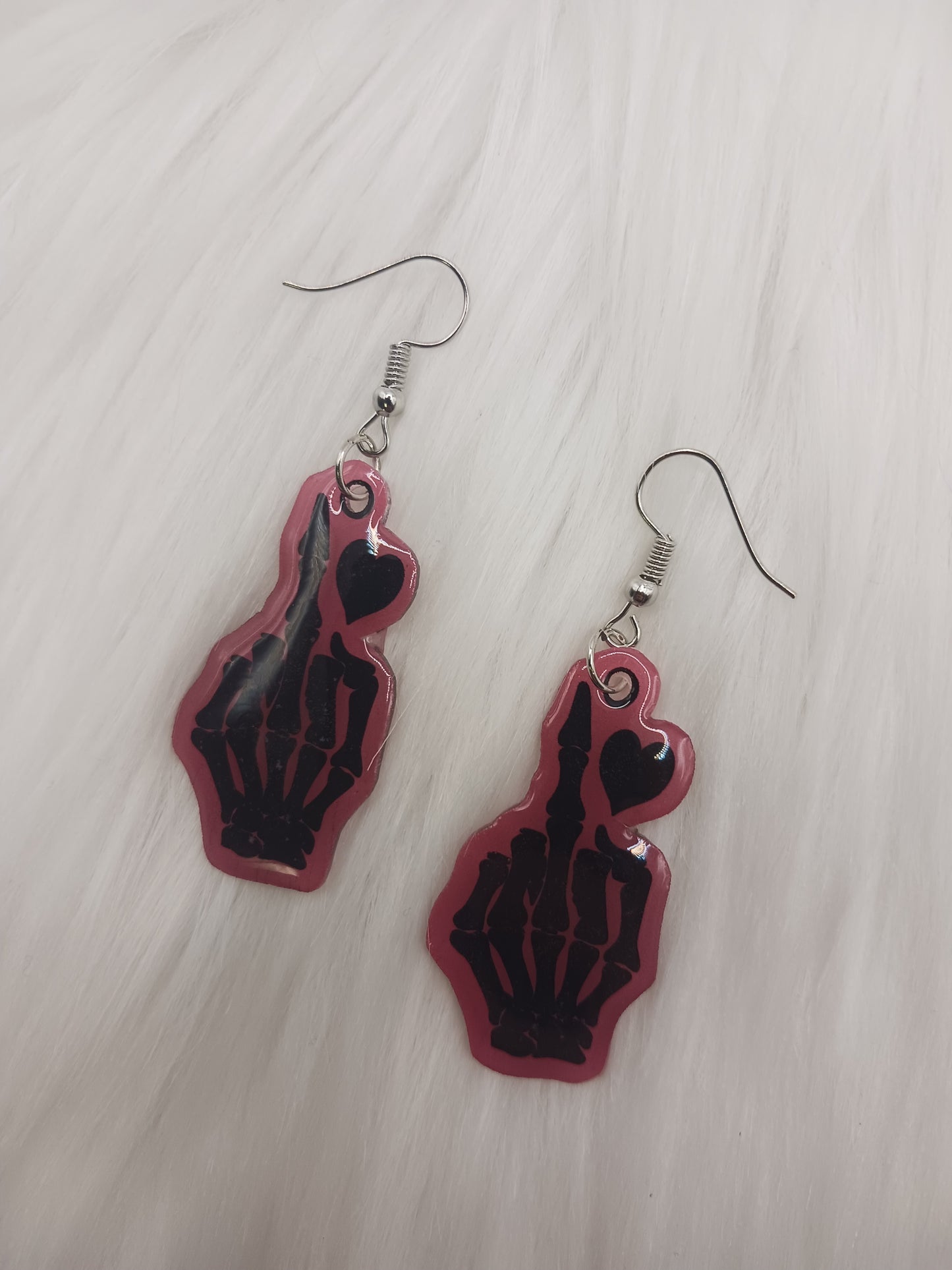 Middle finger dangle earrings