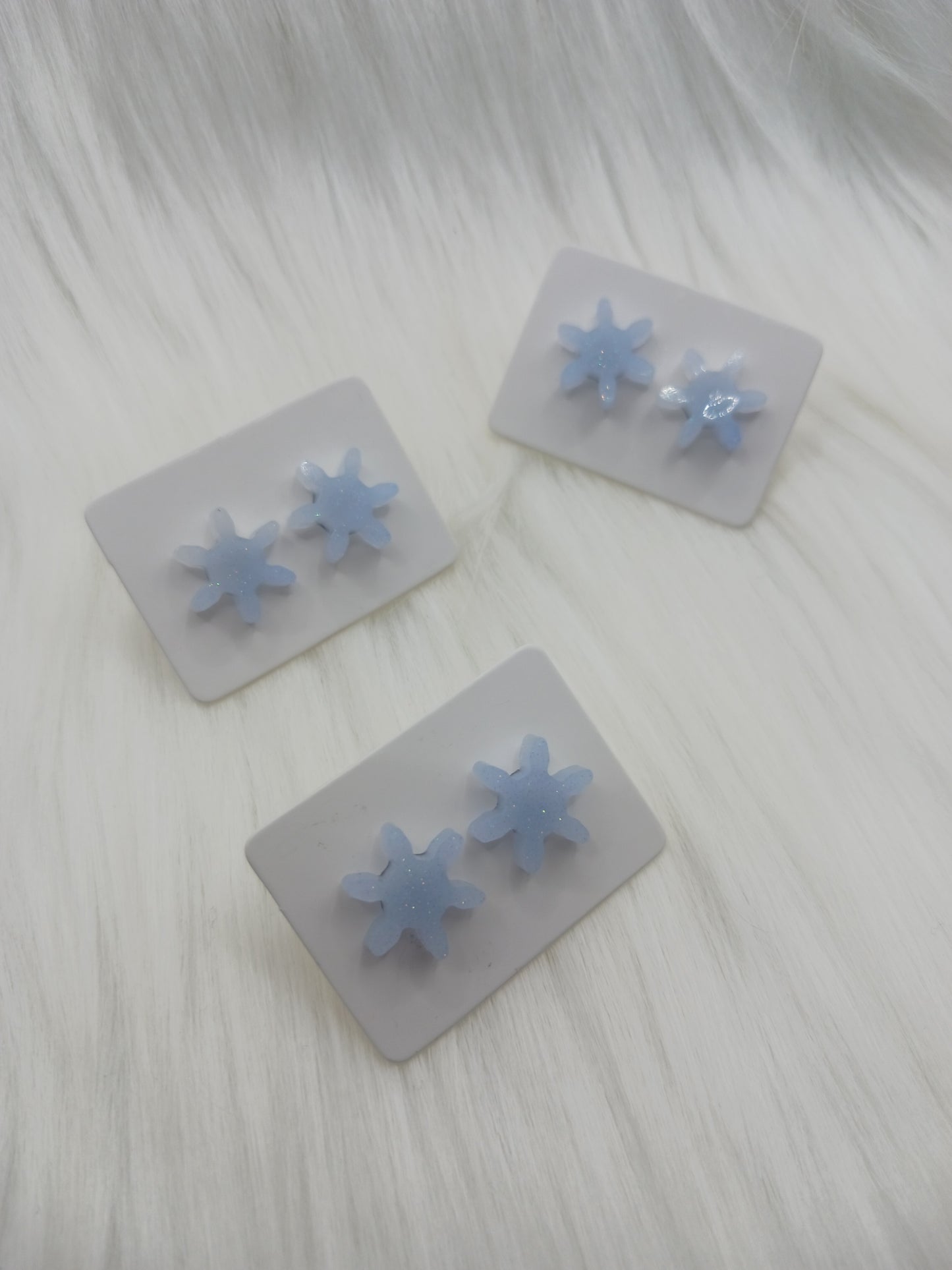 Snowflake stud earrings