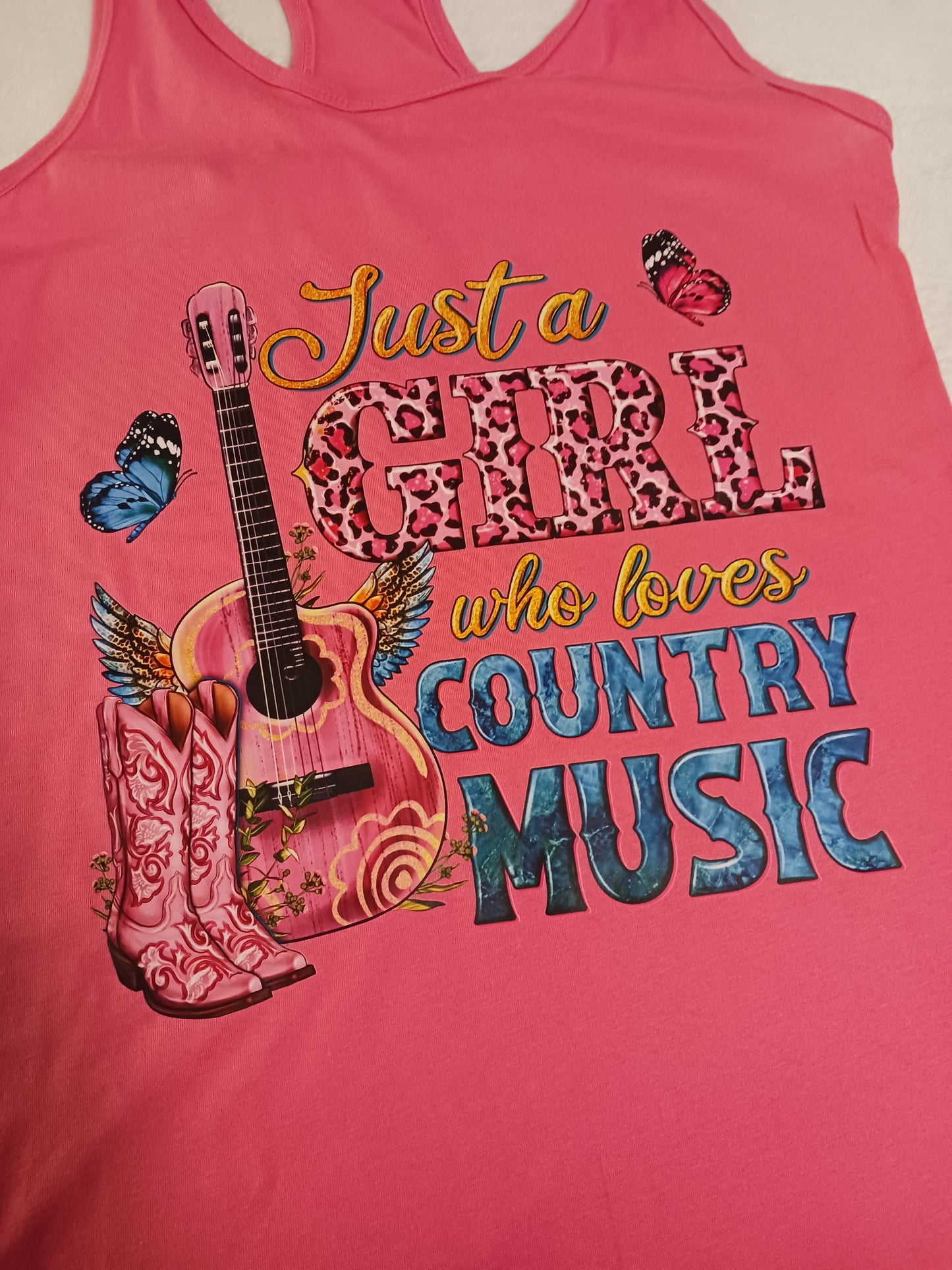 Just a girl who loves country music flowy racerback tank top