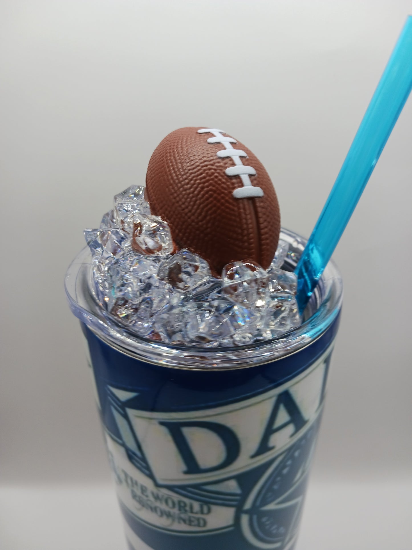 Boyz tumbler with football ice topper lid