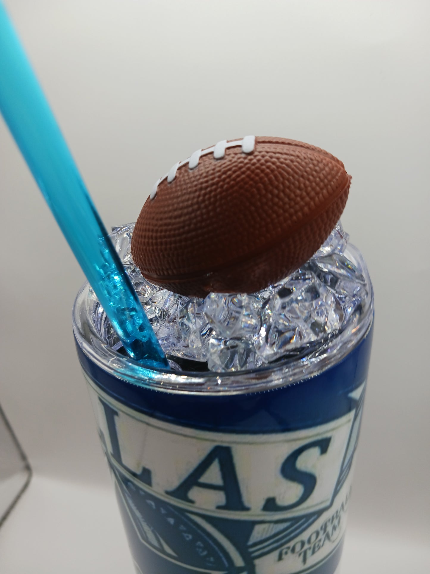 Boyz tumbler with football ice topper lid