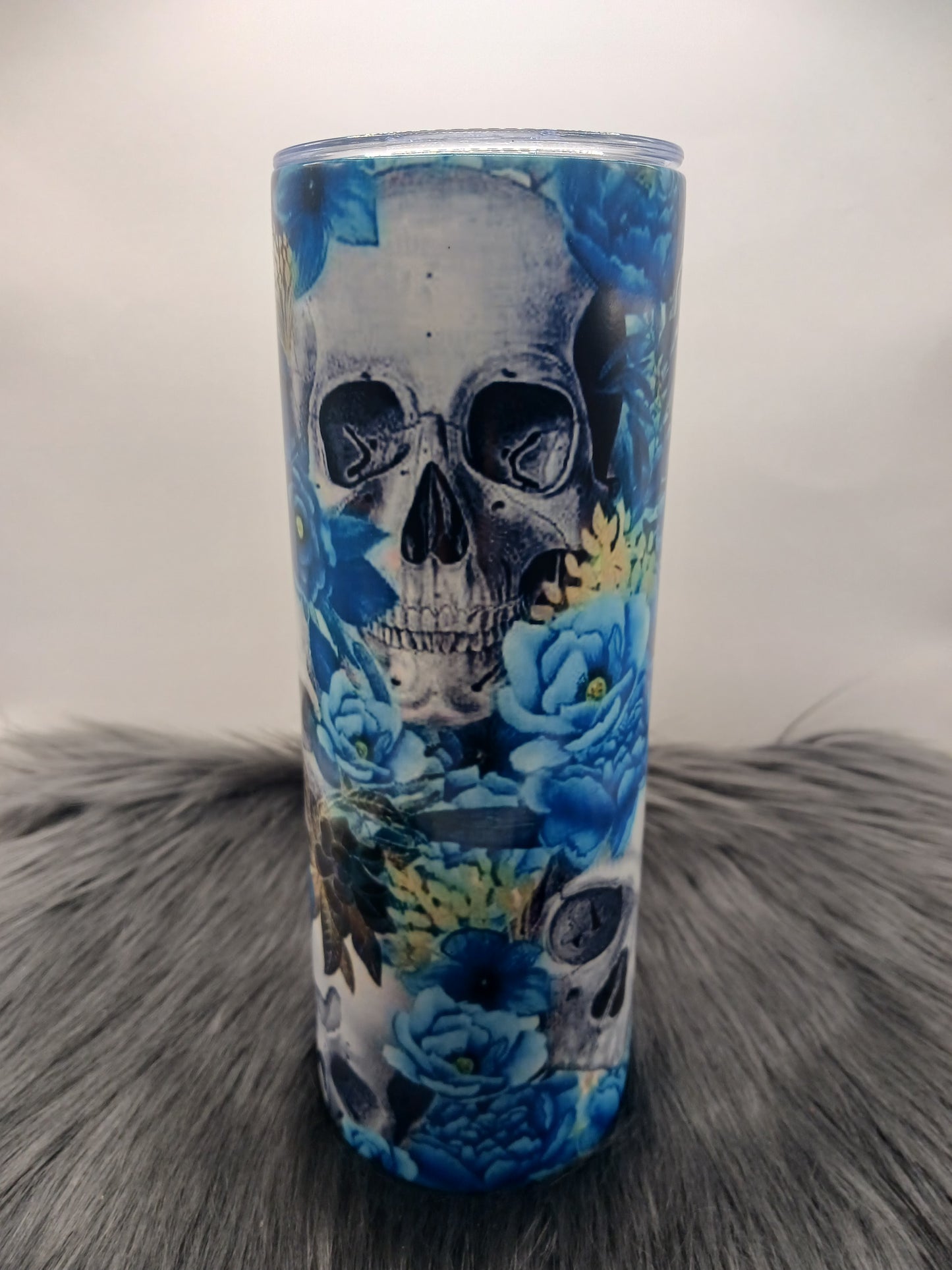 Blue flowery skull glow in the dark tumbler