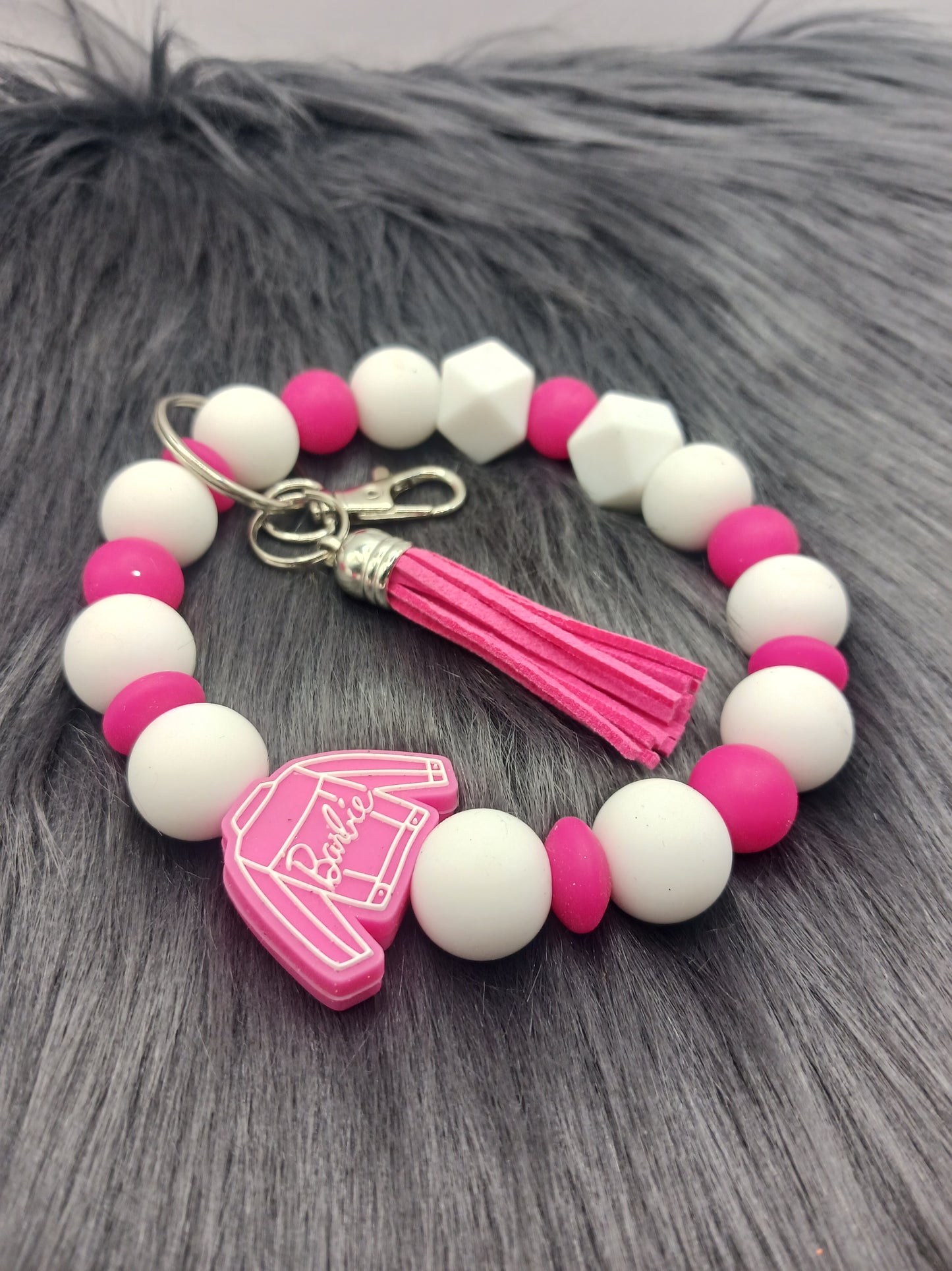 Pink doll silicone beaded wristlet with tassel