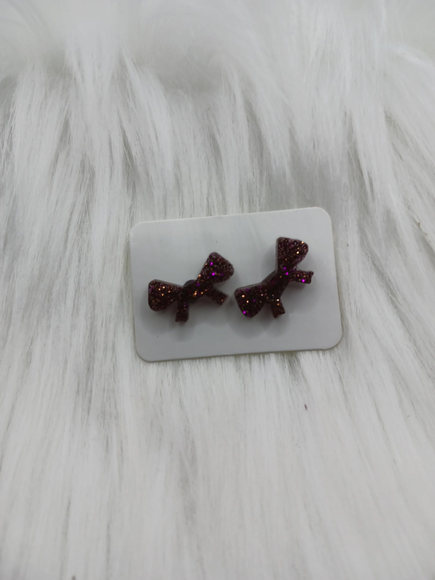 Bow shape stud earrings